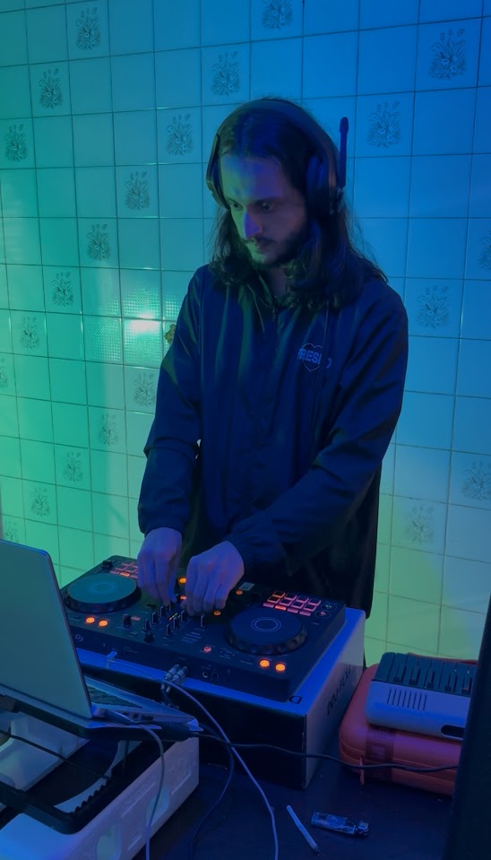 DJ mixer close up with neon lights